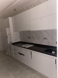 WHITE AND BLACK MODERN KITCHEN CABINET